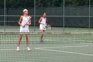 Madeline Earle and Pallavi Kawatra prepare to return a serve in their doubles match at Long Branch High School on Oct. 20. Photo by Nicole LoRusso